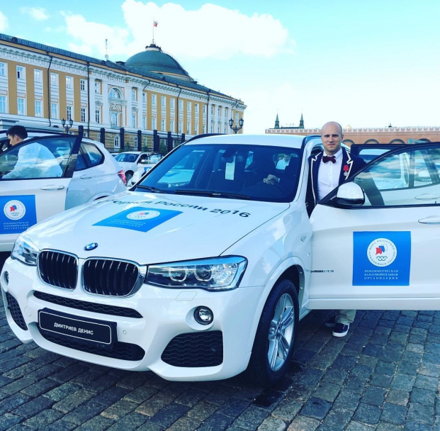 Денис Дмитриев получил медаль от Путина и BMW от Медведева